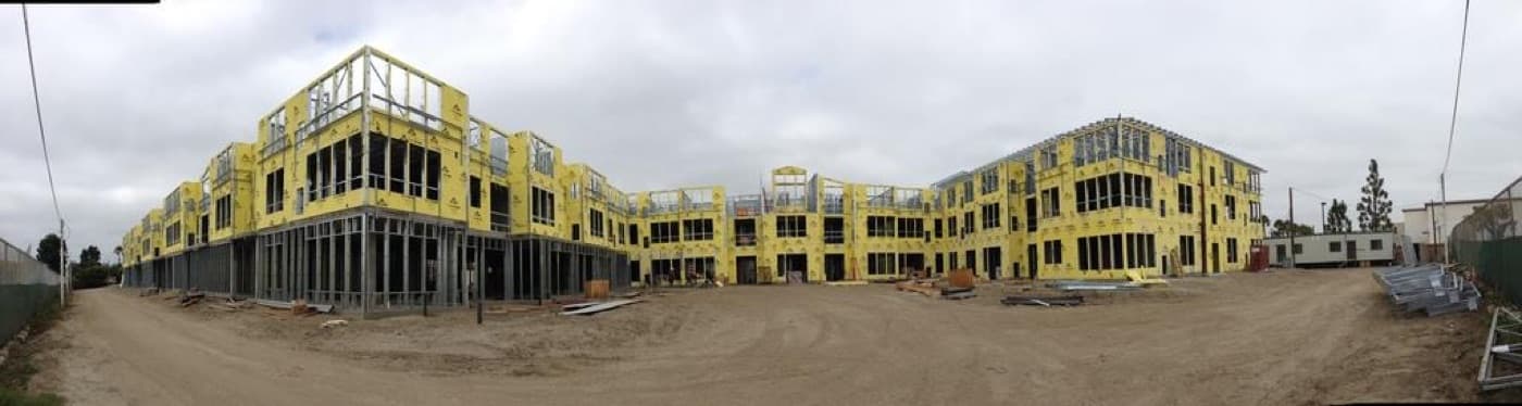 Panorama of the Merrill Gardens Huntington Beach senior living facility under construction.