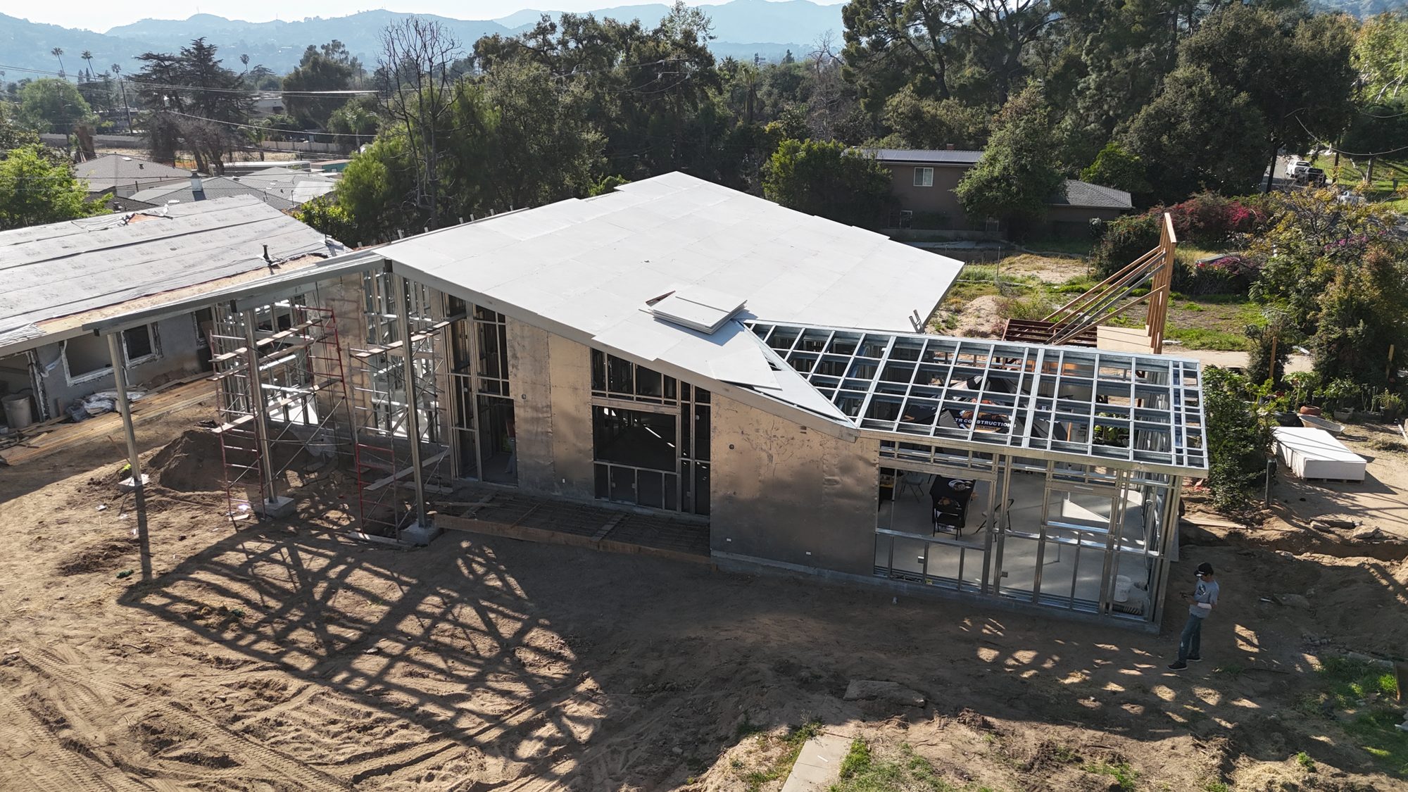 Aerial of the finished 480 West Palm steel frame in daylight.