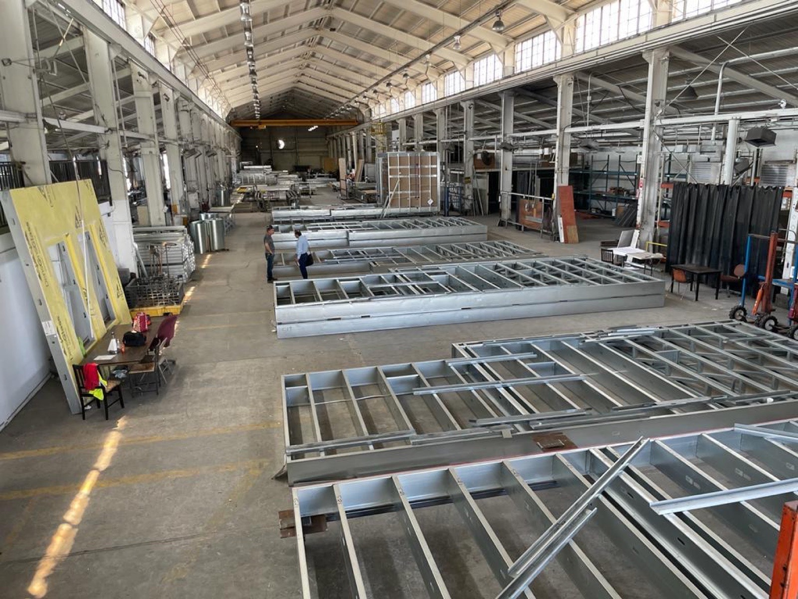 Finished light gauge steel studs and track stacked at the plant.