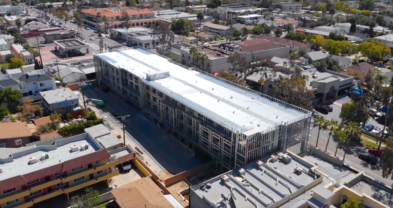 Aerial view of the Holiday Inn & Suites in Glendale framed in light gauge steel within the surrounding neighborhood.