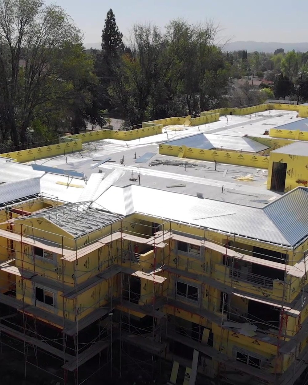 Aerial view of the 17349 Roscoe Boulevard senior housing development in Northridge under construction, framed in panelized light gauge steel.